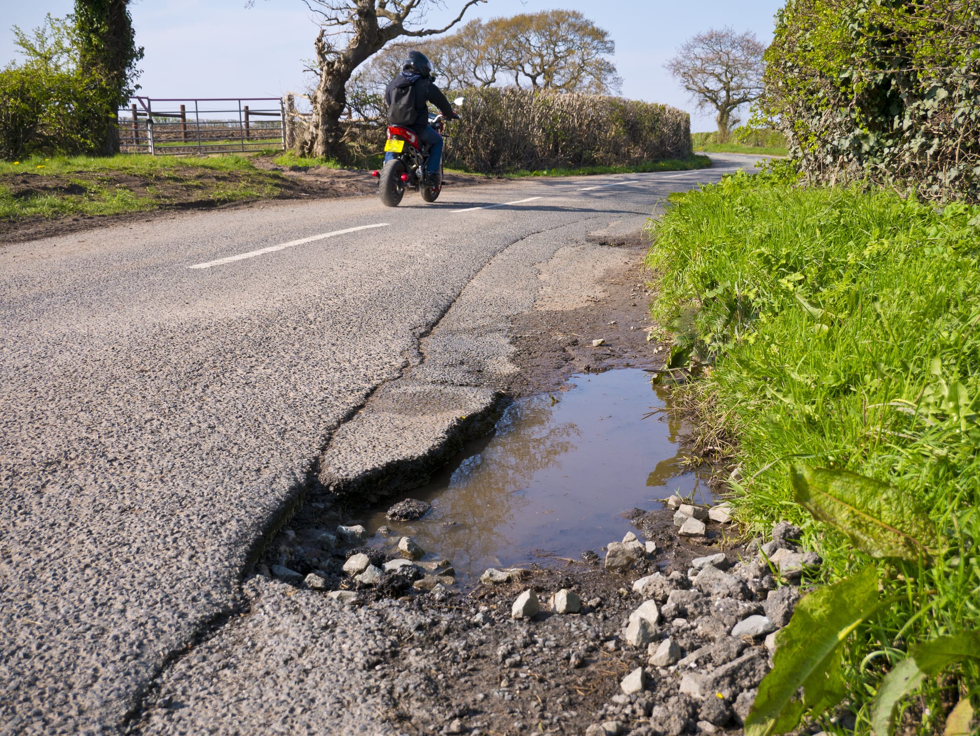 vehicle damage pothole